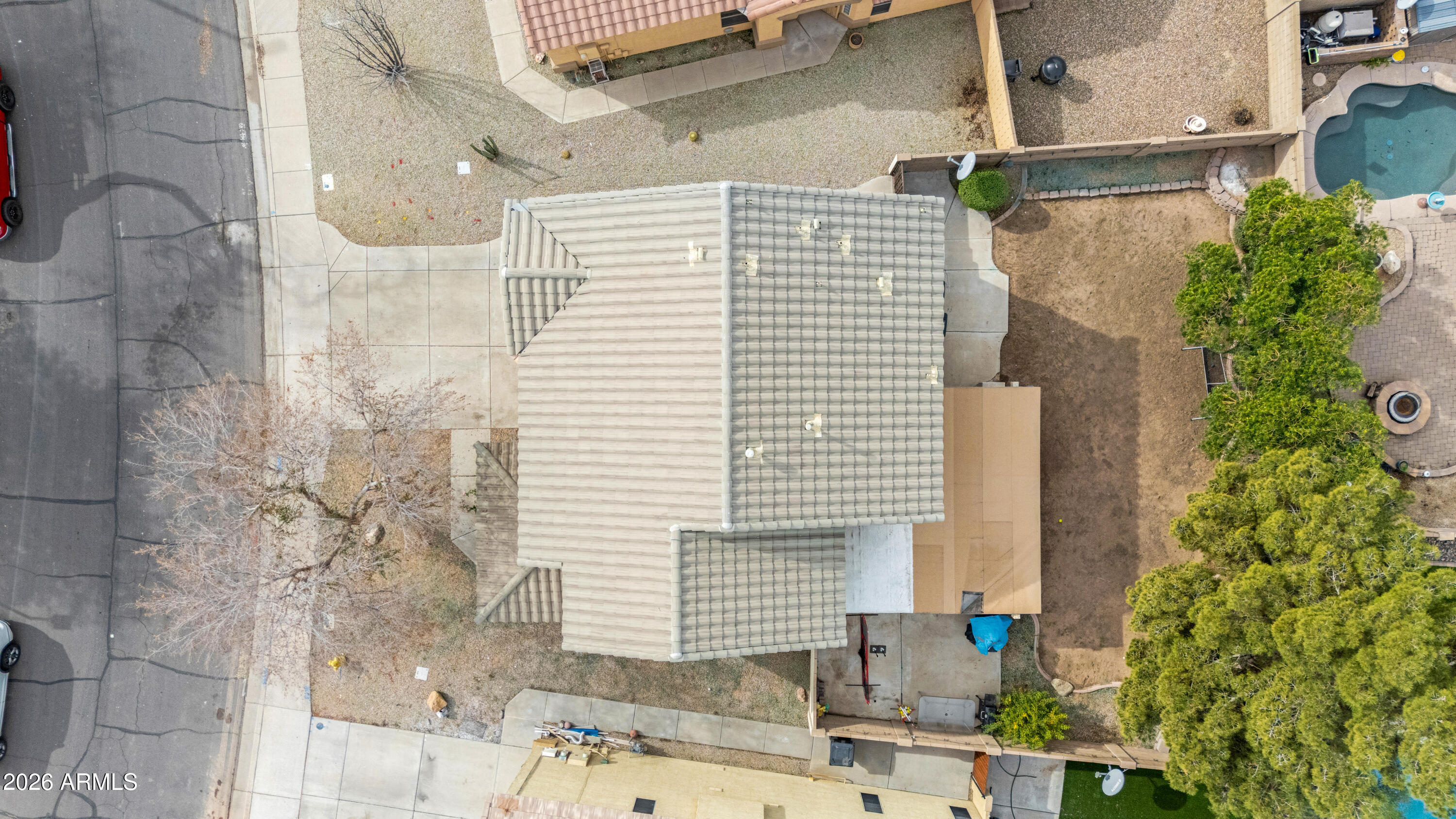 1810 East Milky Way Gilbert, AZ 85295 - Photo 39 of 46 a view of a bathroom with a shower and a mirror