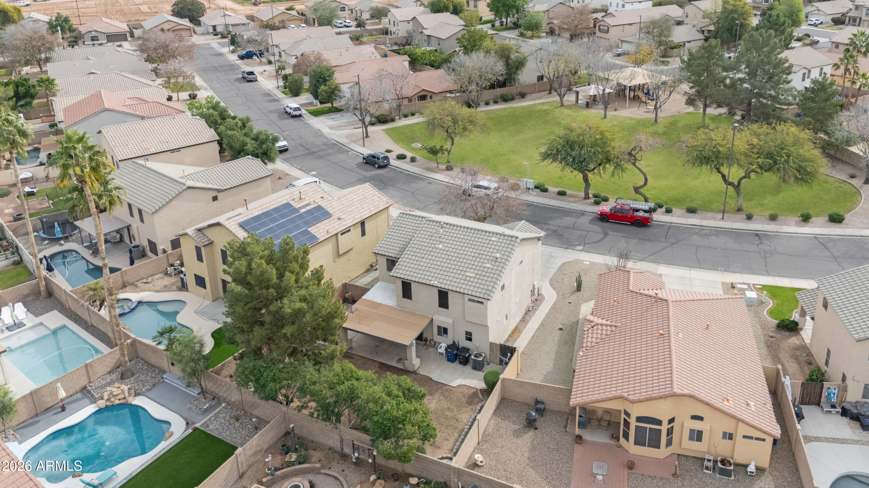 1810 East Milky Way Gilbert, AZ 85295 - Photo 41 of 46 an aerial view of a house with a yard