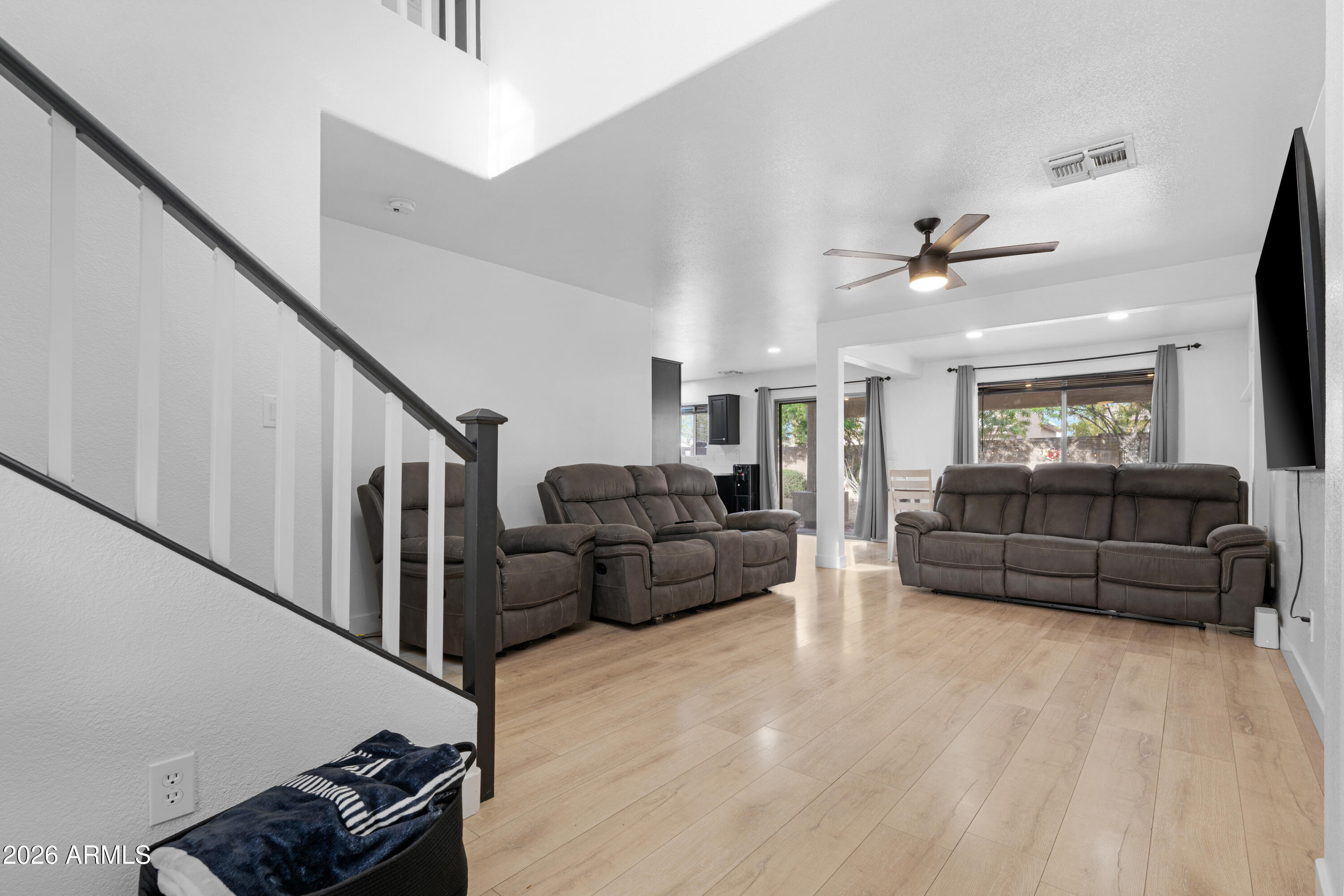 1810 East Milky Way Gilbert, AZ 85295 - Photo 5 of 46 a living room with furniture and wooden floor