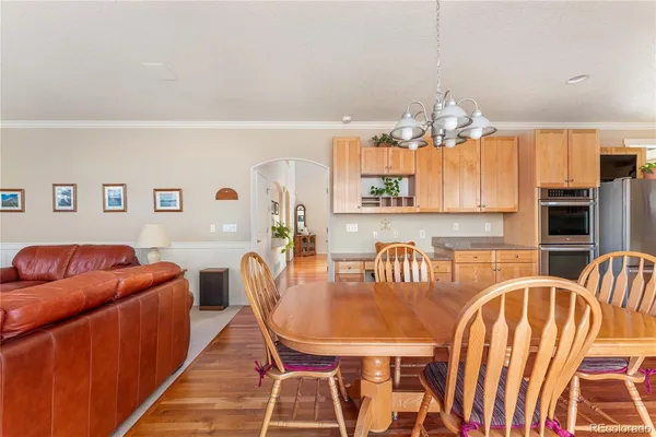 a view of a dining room with furniture
