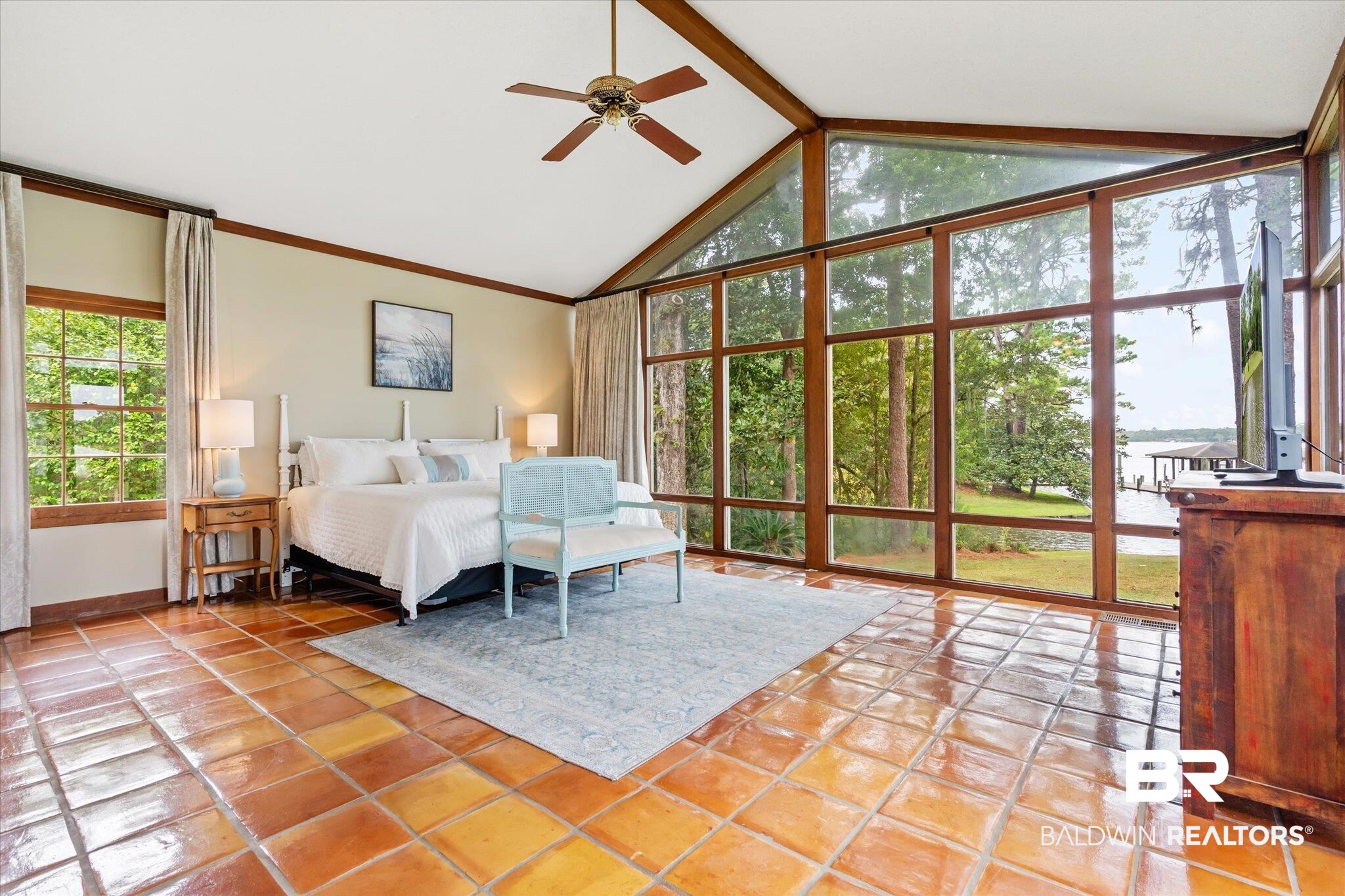 2228 Riverside Drive Mobile, AL 36605 - Photo 21 of 51 Tiled bedroom with ceiling fan and vaulted ceiling with beams