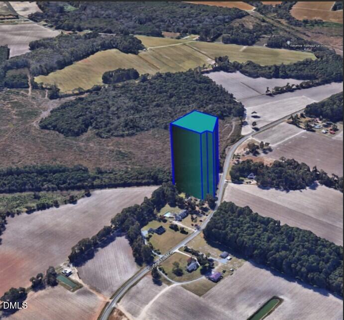 4266 Sids Mill Road Fayetteville, NC 28312 - Photo 2 of 6 a view of a backyard of the house