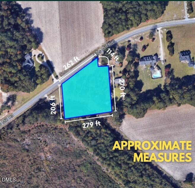 4266 Sids Mill Road Fayetteville, NC 28312 - Photo 4 of 6 a view of a sign in front of a road