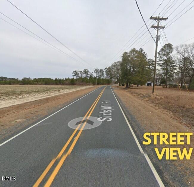 4266 Sids Mill Road Fayetteville, NC 28312 - Photo 5 of 6 a view of a street with an ocean view