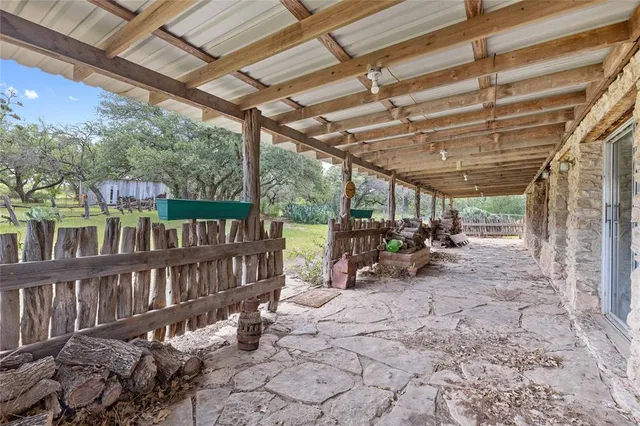 a view of a room with wooden walls