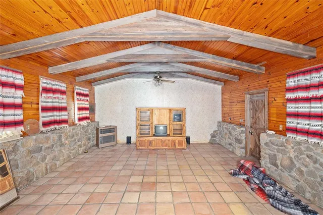 a front view of a house with outdoor seating