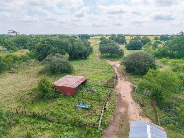 a backyard of a painted wall