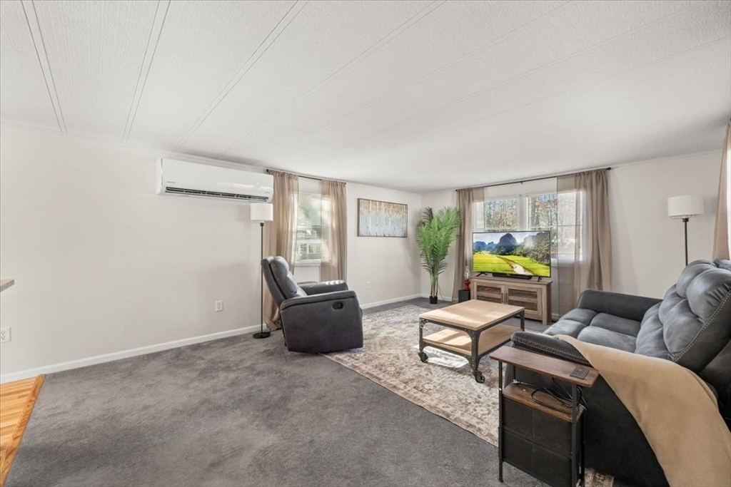 199 Windswept Road Wareham, MA 02571 - Photo 16 of 30 a living room with furniture and a window