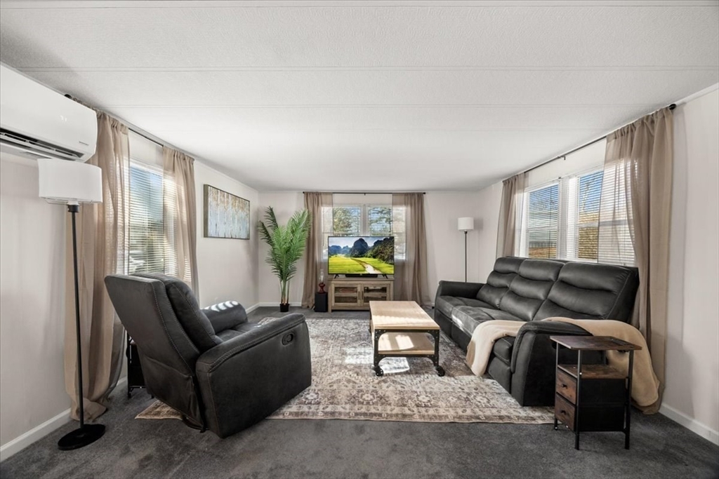 199 Windswept Road Wareham, MA 02571 - Photo 17 of 30 a living room with furniture and a window