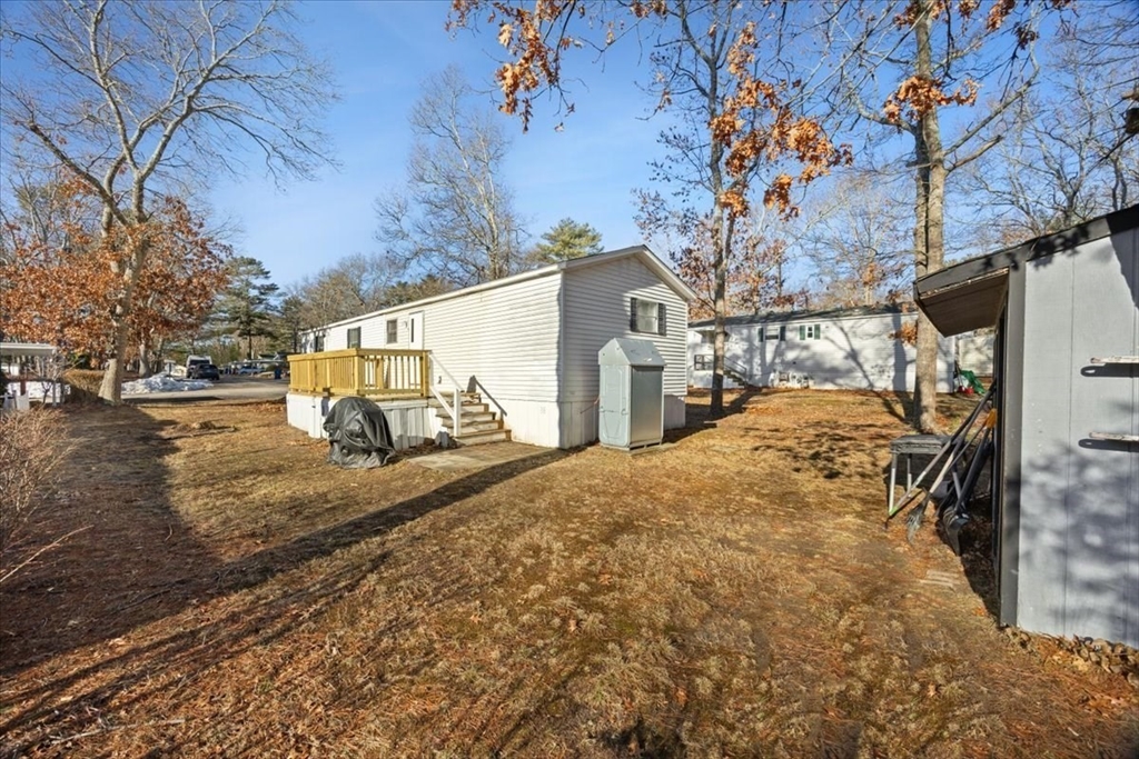 199 Windswept Road Wareham, MA 02571 - Photo 28 of 30 a view of a large house with a snow on the road