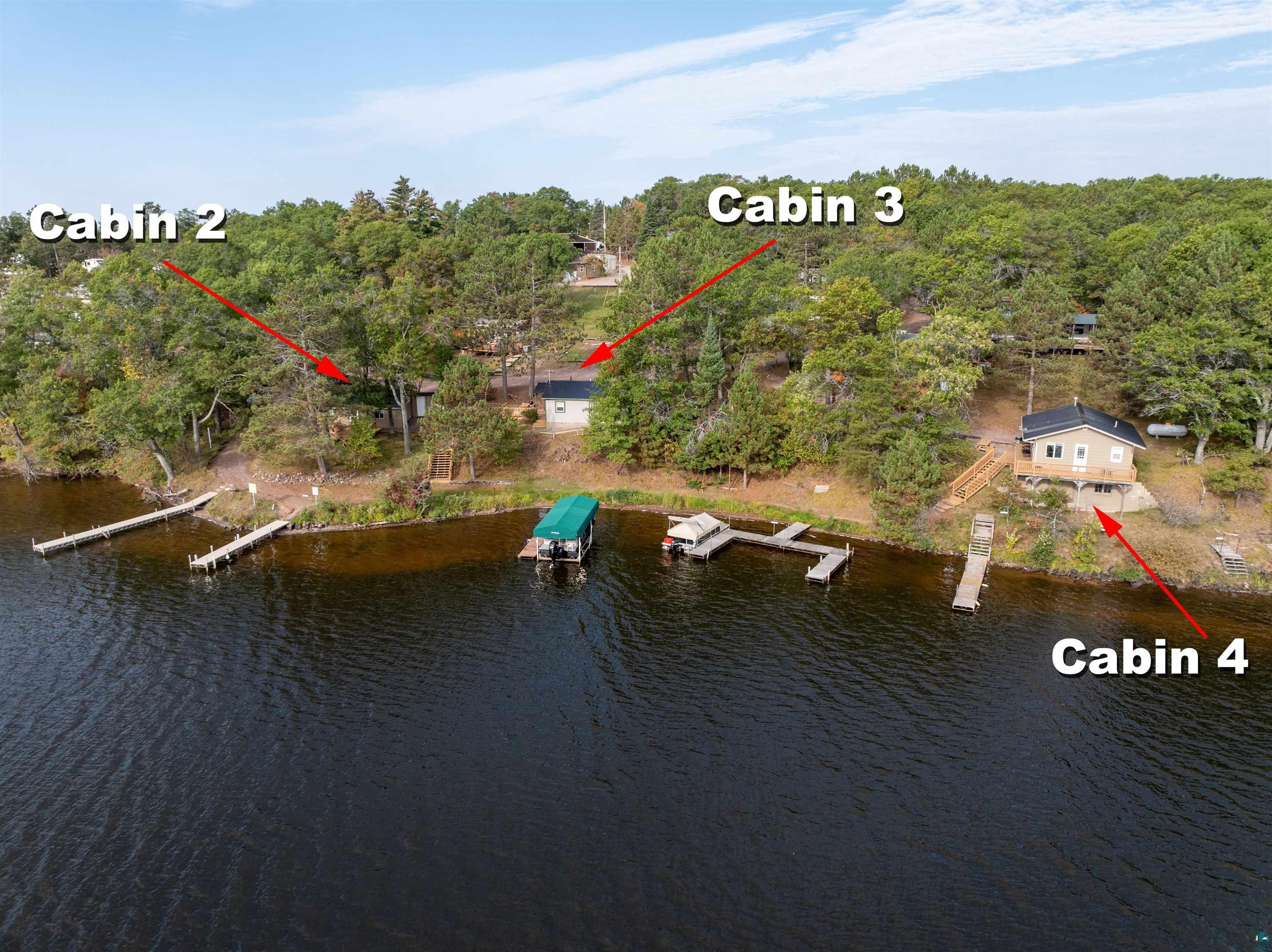 6833 View Point Lodge Road, Unit 14 Gordon, WI 54838 - Photo 3 of 34 Aerial view of a nearby body of water