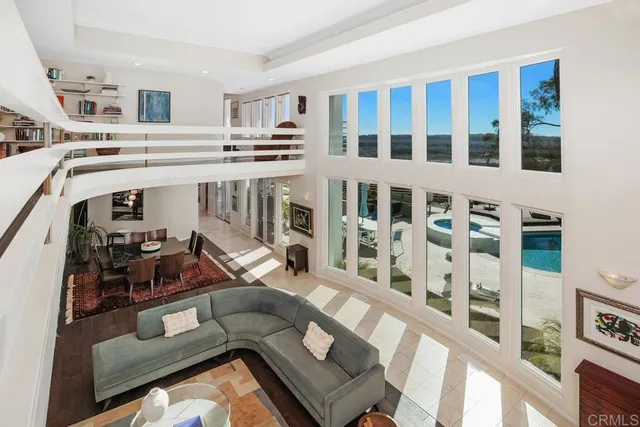 a bedroom with furniture and a fireplace