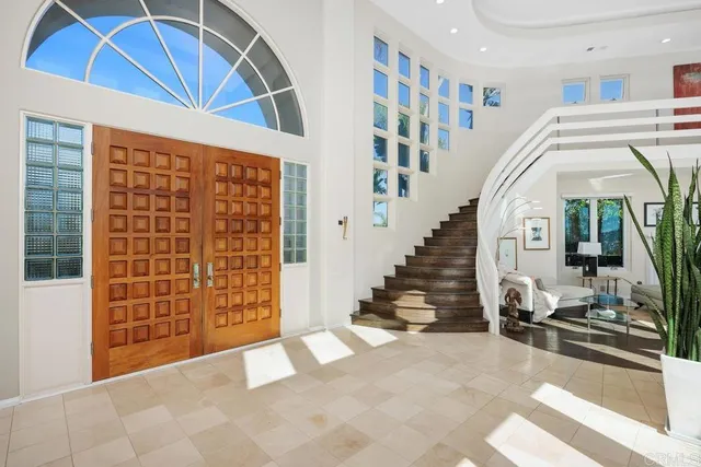 a view of entryway livingroom and hall