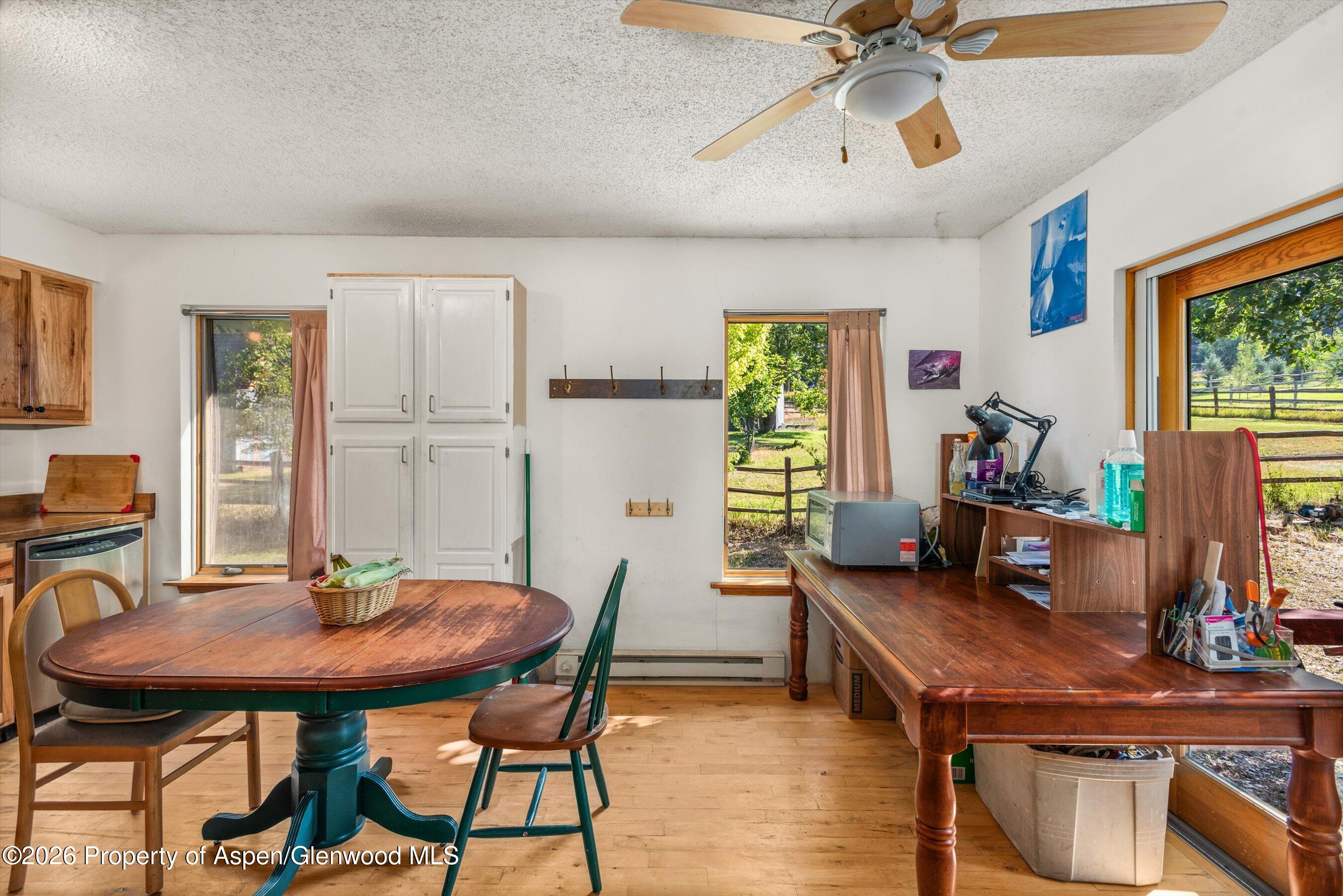 198 Holland Hills Road Basalt, CO 81621 - Photo 18 of 50 a view of a dining room with furniture and window