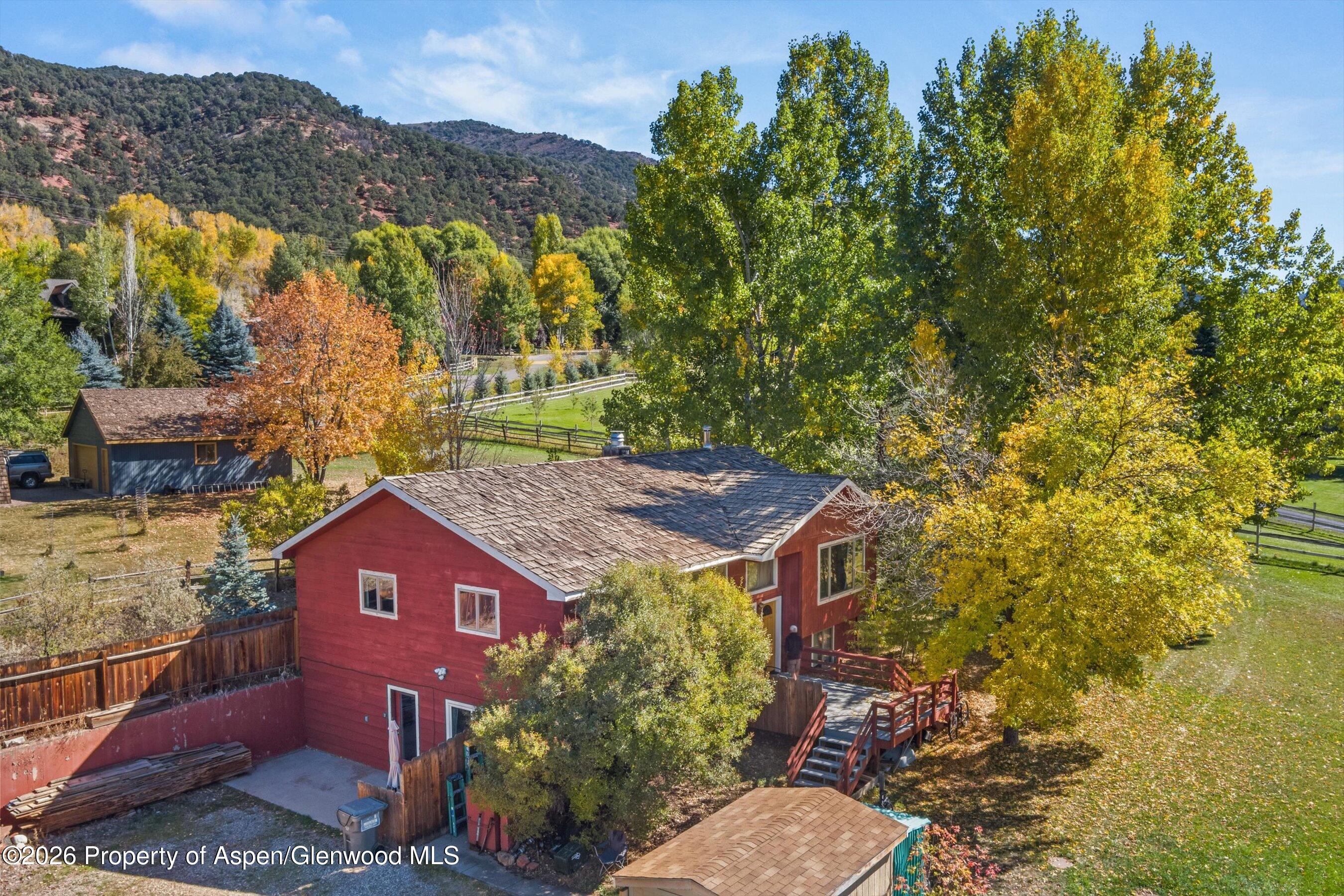 198 Holland Hills Road Basalt, CO 81621 - Photo 2 of 50 a view of a house with a yard