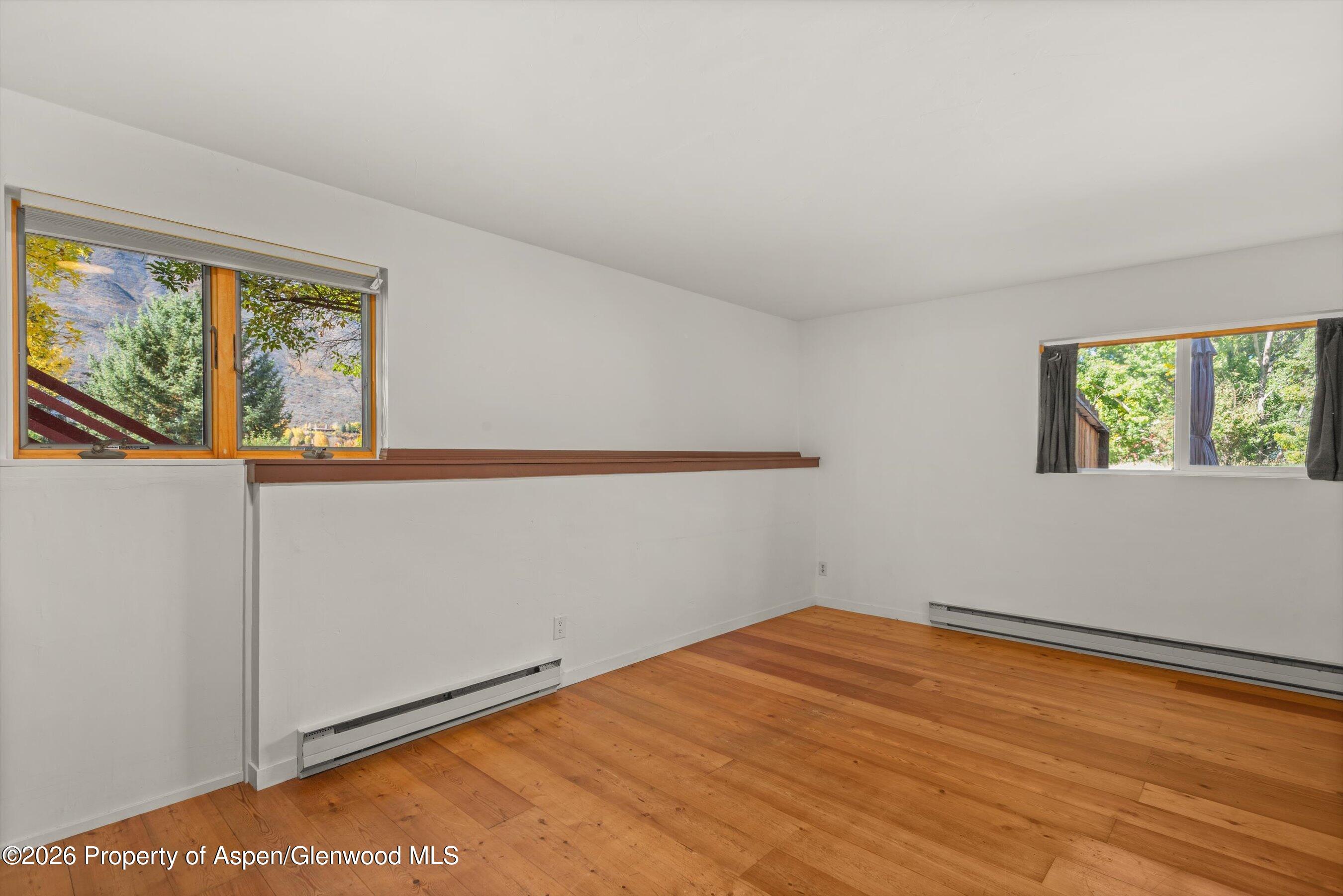 198 Holland Hills Road Basalt, CO 81621 - Photo 32 of 50 an empty room with a window