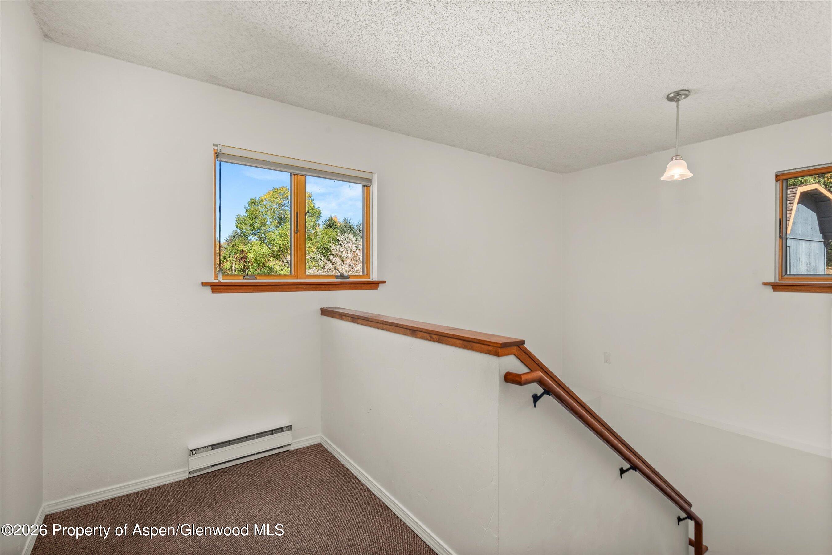 198 Holland Hills Road Basalt, CO 81621 - Photo 38 of 50 a view of hallway with stairs