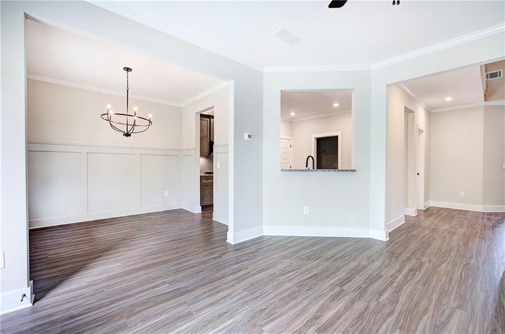 266 Summit Height Drive Cartersville, GA 30121 - Photo 11 of 51 a view of an entryway with wooden floor and cabinet