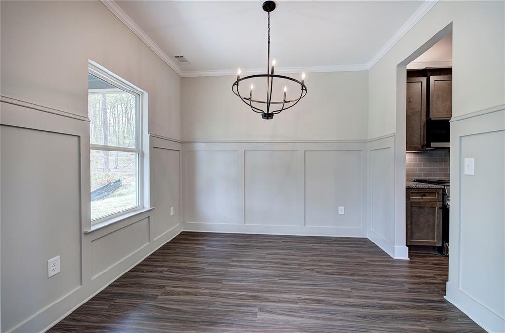 266 Summit Height Drive Cartersville, GA 30121 - Photo 15 of 51 a view of empty room with wooden floor and window