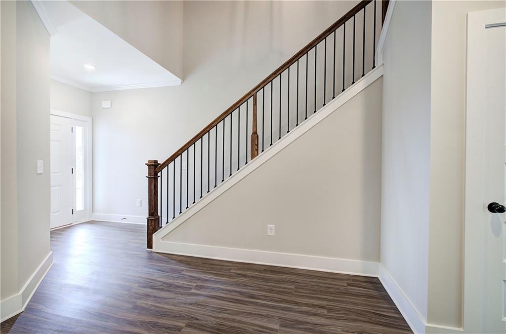 266 Summit Height Drive Cartersville, GA 30121 - Photo 24 of 51 a view of staircase with wooden floor and stairs