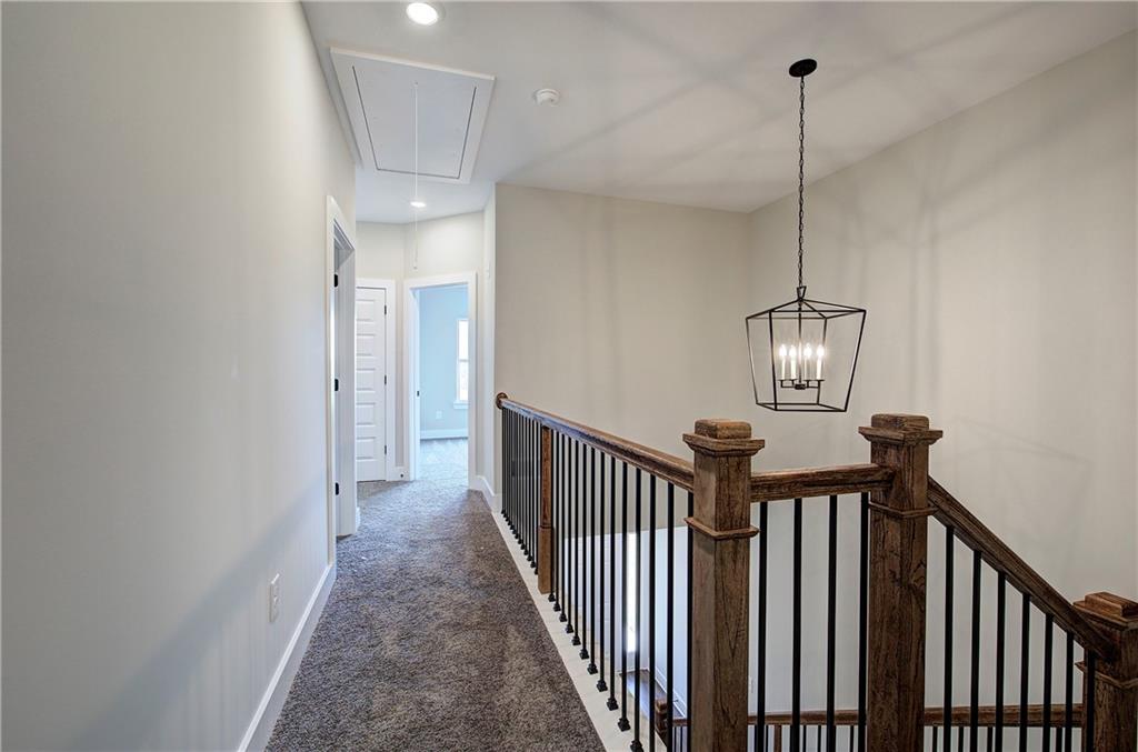 266 Summit Height Drive Cartersville, GA 30121 - Photo 26 of 51 a view of a hallway with a chandelier