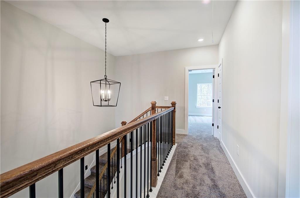 266 Summit Height Drive Cartersville, GA 30121 - Photo 27 of 51 a view of a hallway with chandelier