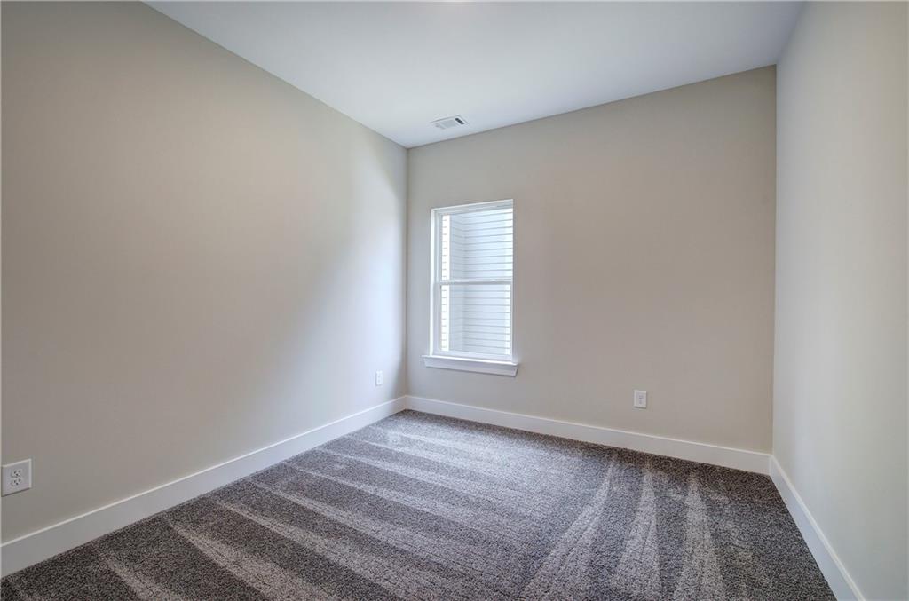 266 Summit Height Drive Cartersville, GA 30121 - Photo 36 of 51 a view of an empty room with a window