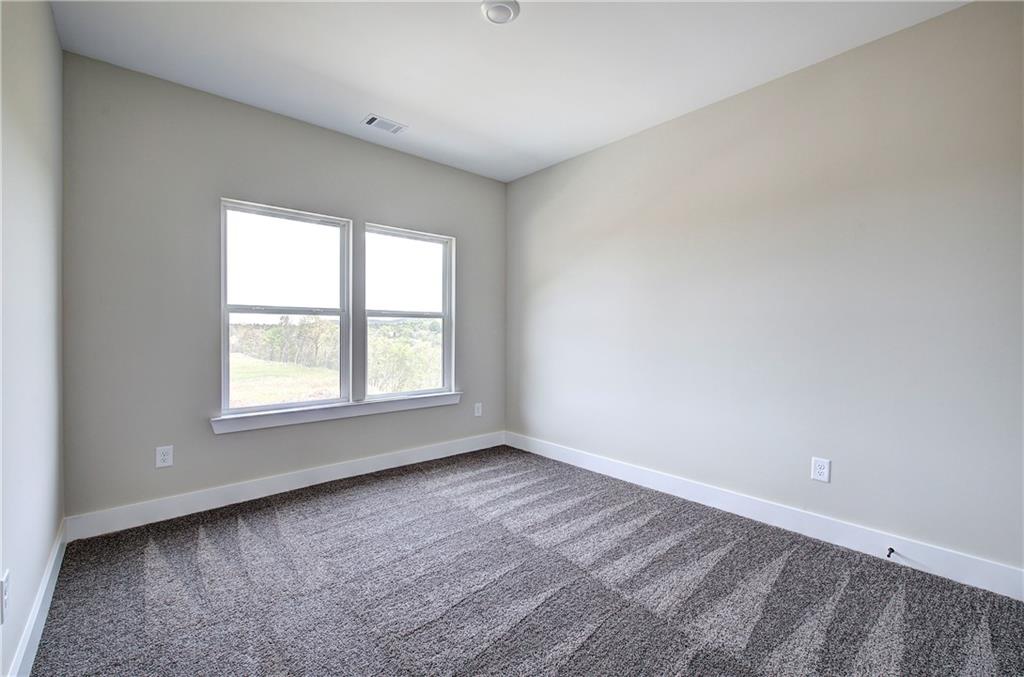 266 Summit Height Drive Cartersville, GA 30121 - Photo 38 of 51 an empty room with a window