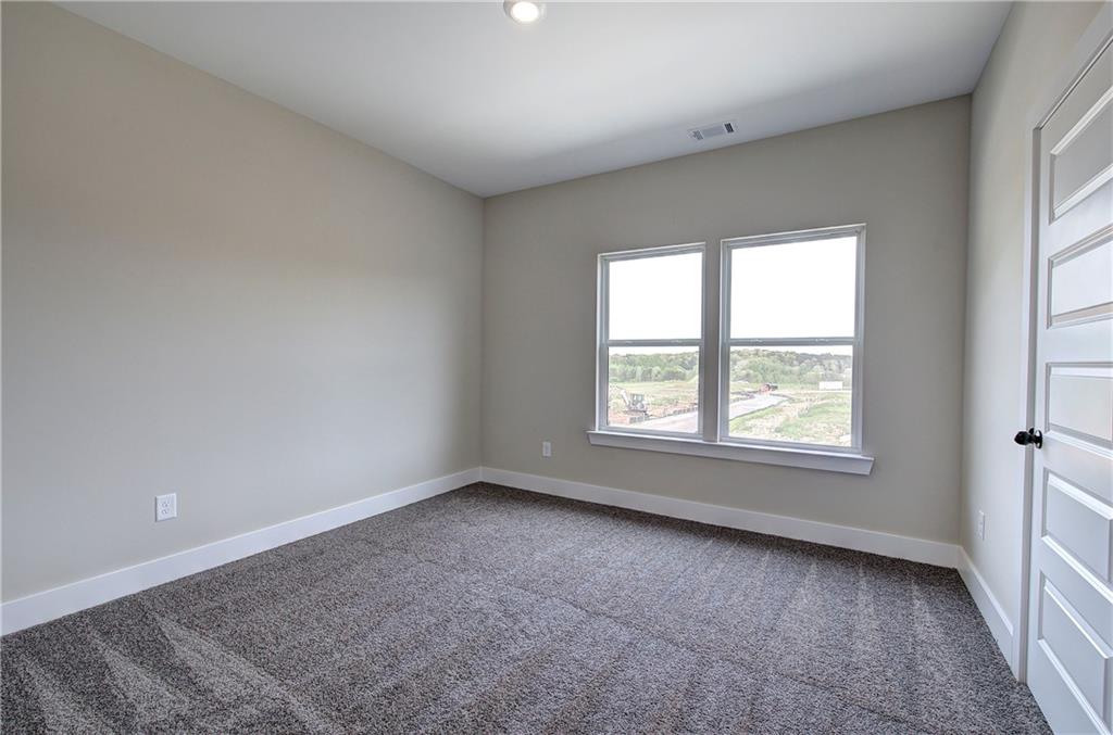266 Summit Height Drive Cartersville, GA 30121 - Photo 41 of 51 an empty room with a window
