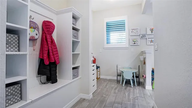 a view of backyard of house with seating space