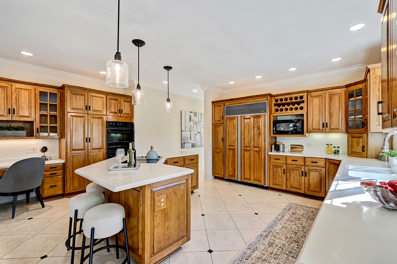 540 Ridgemoor Drive Willowbrook, IL 60527 - Photo 12 of 62 a large kitchen with a table and chairs