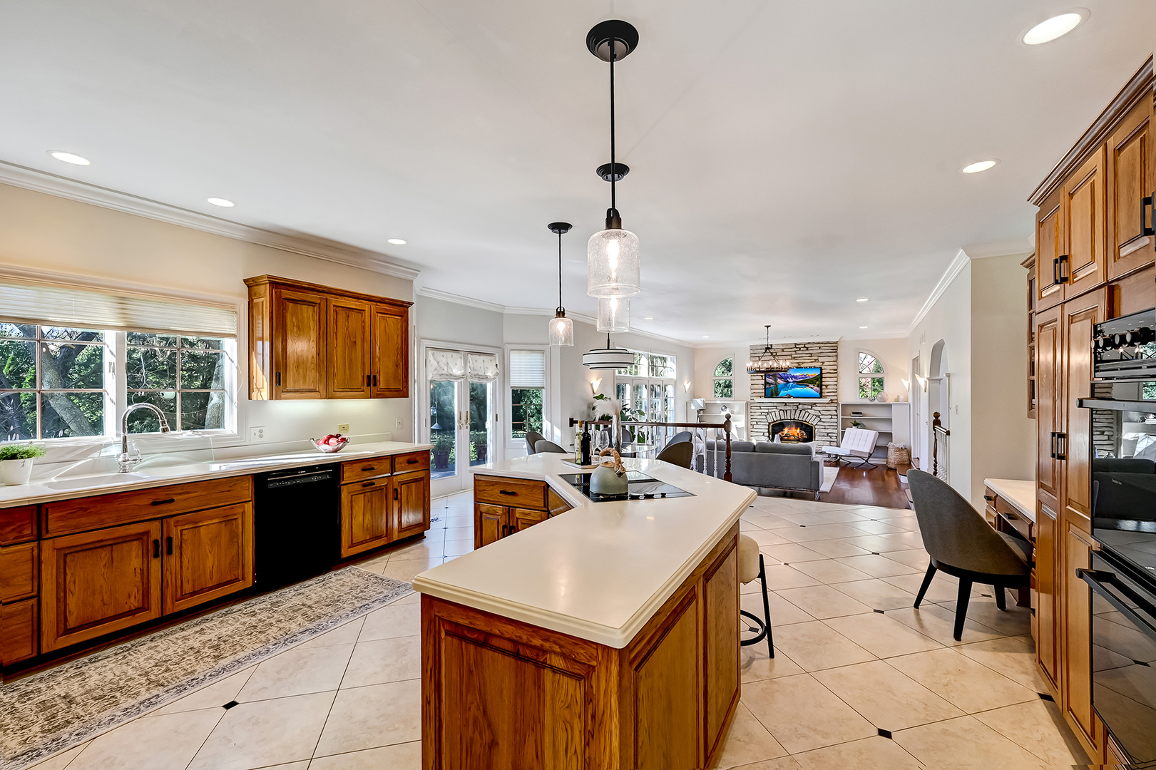 540 Ridgemoor Drive Willowbrook, IL 60527 - Photo 13 of 62 a large kitchen with lots of counter space and windows