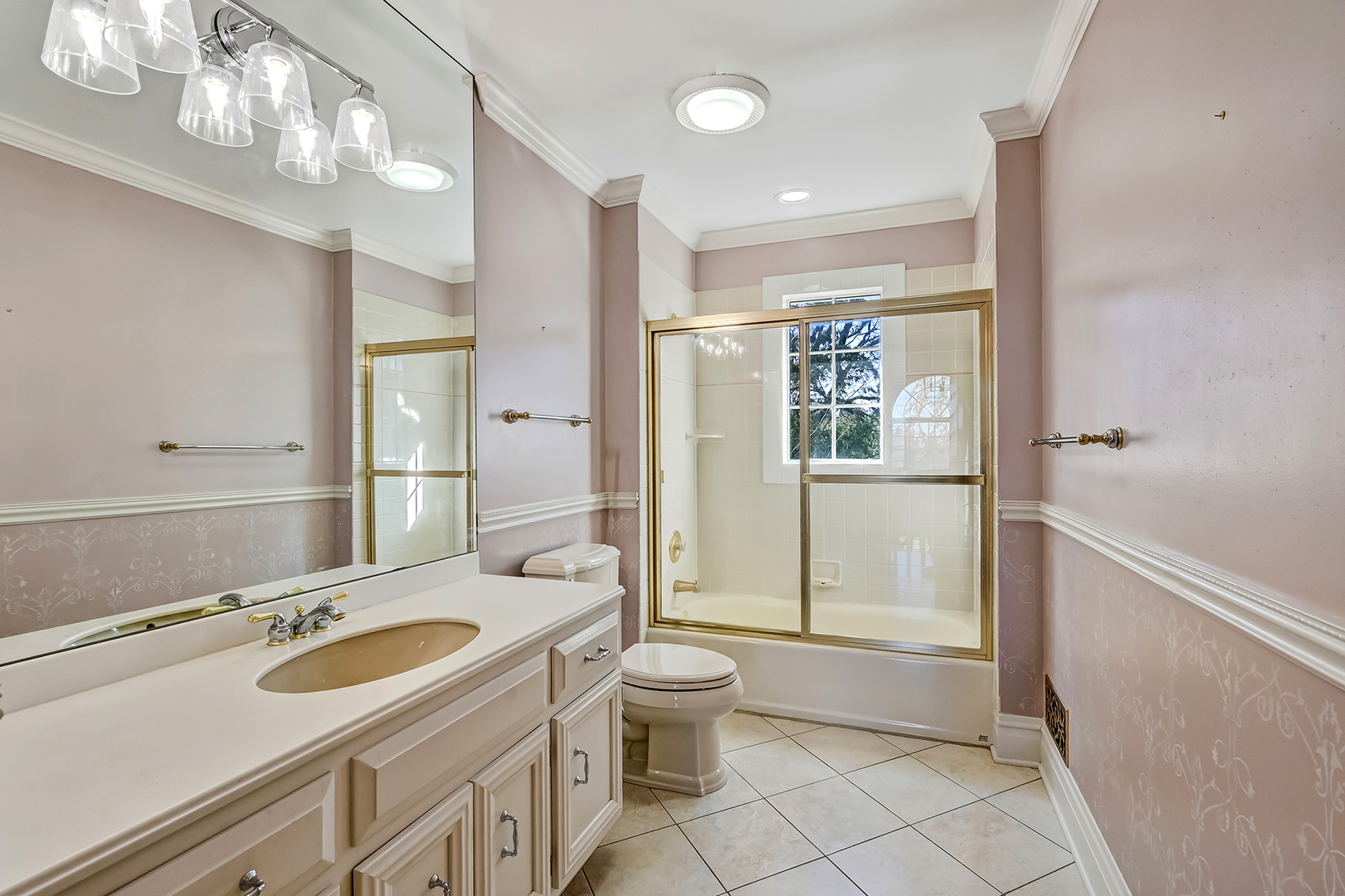 540 Ridgemoor Drive Willowbrook, IL 60527 - Photo 23 of 62 a spacious bathroom with a sink a toilet a mirror and shower