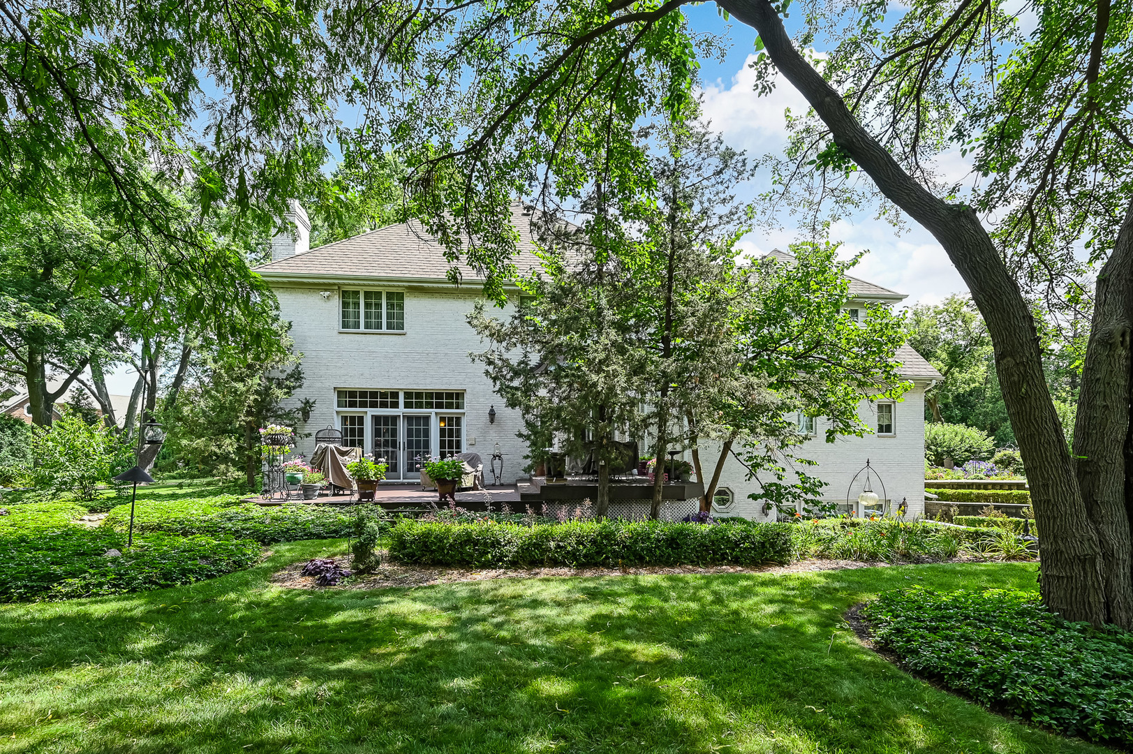 540 Ridgemoor Drive Willowbrook, IL 60527 - Photo 46 of 62 a view of a house with a big yard and large trees