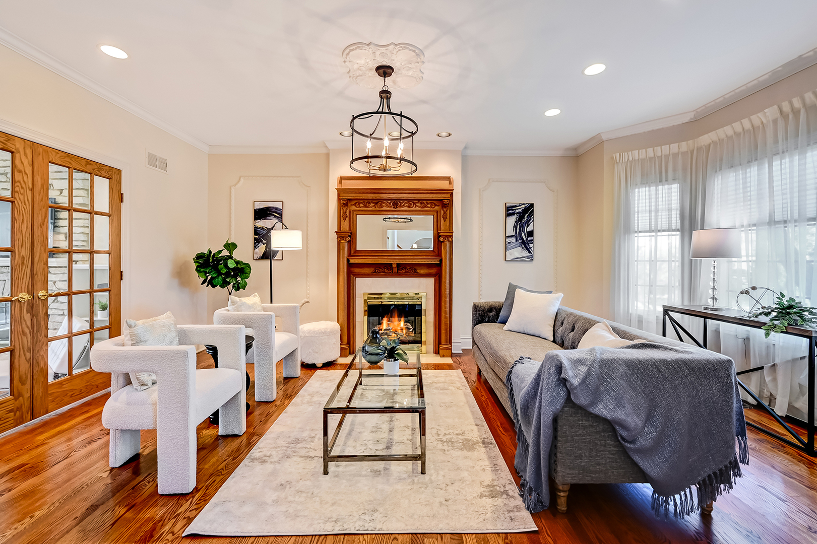 540 Ridgemoor Drive Willowbrook, IL 60527 - Photo 6 of 62 a living room with fireplace furniture and a wooden floor