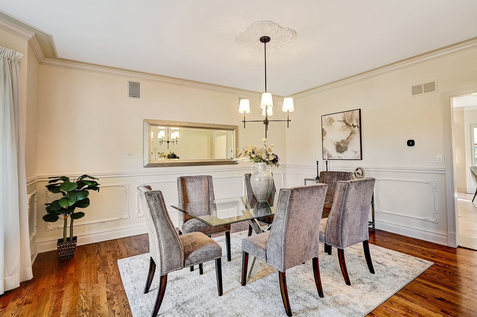 540 Ridgemoor Drive Willowbrook, IL 60527 - Photo 8 of 62 a view of a dining room with furniture window and wooden floor