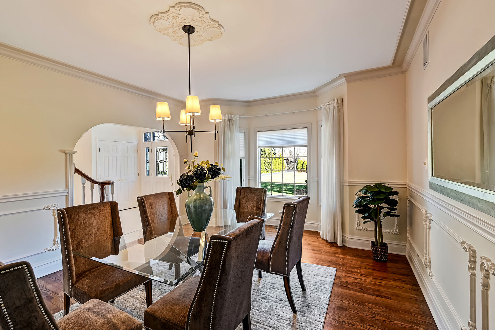 540 Ridgemoor Drive Willowbrook, IL 60527 - Photo 9 of 62 a dining room with furniture potted plants