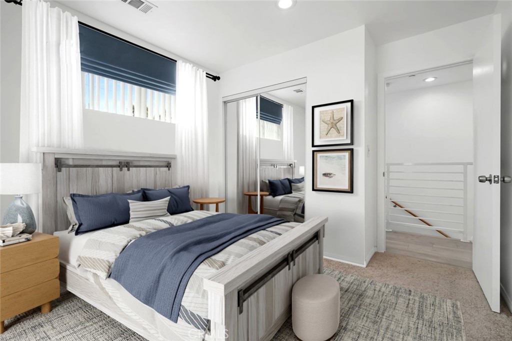 14241-1 Magnolia Boulevard Sherman Oaks, CA 91423 - Photo 5 of 16 a bedroom with a bed and a couch