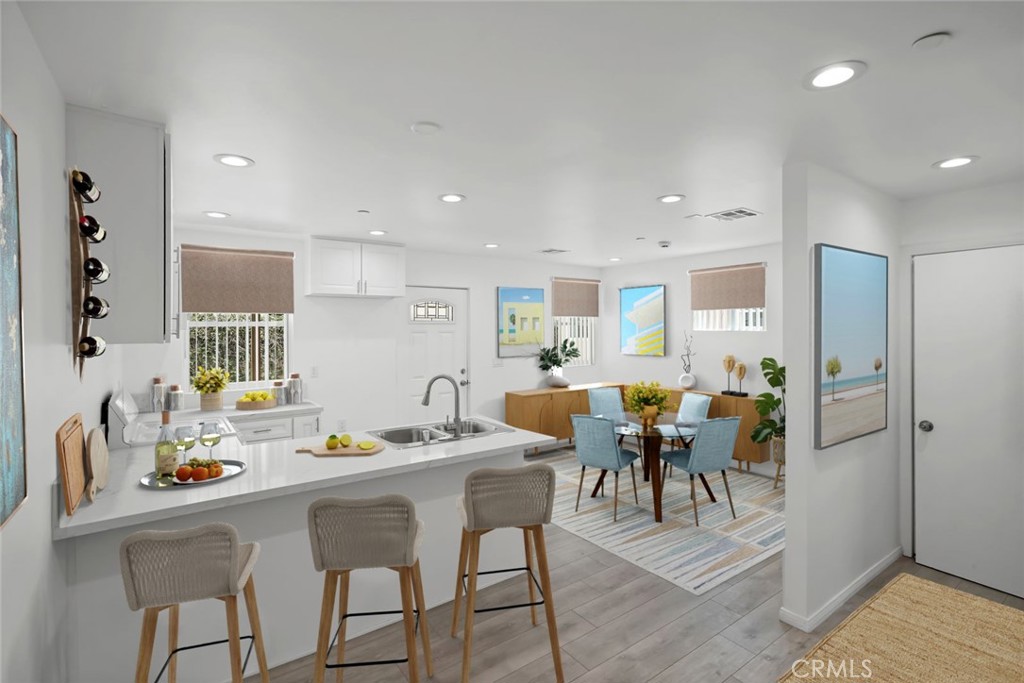 14241-1 Magnolia Boulevard Sherman Oaks, CA 91423 - Photo 7 of 16 a view of a dining room with furniture