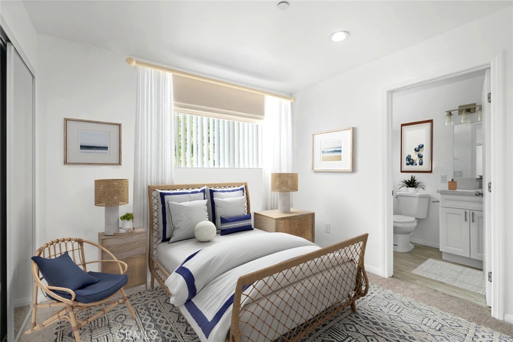 14241-1 Magnolia Boulevard Sherman Oaks, CA 91423 - Photo 9 of 16 a bedroom with a bed and wooden floor