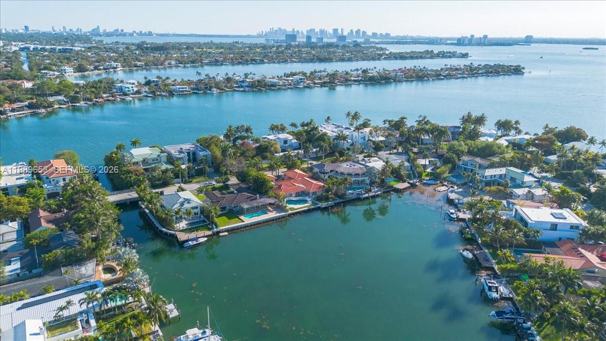 1249 Biscaya Drive Surfside, FL 33154 - Photo 3 of 88 an aerial view of lake residential houses with outdoor space and river