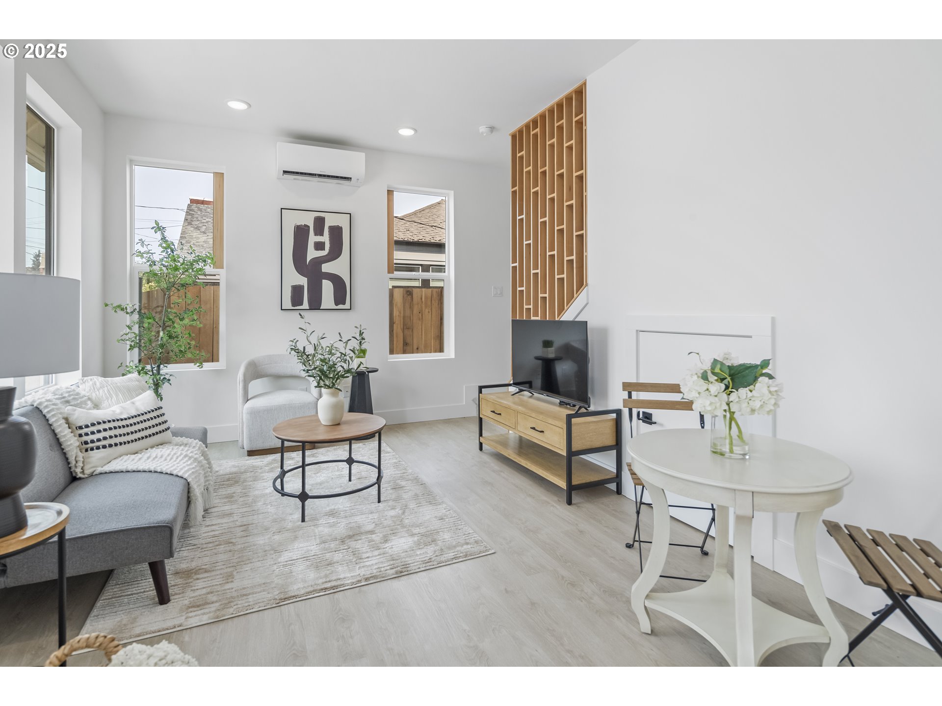 4732 Southeast 65th Avenue Portland, OR 97206 - Photo 4 of 16 a living room with furniture and a potted plant