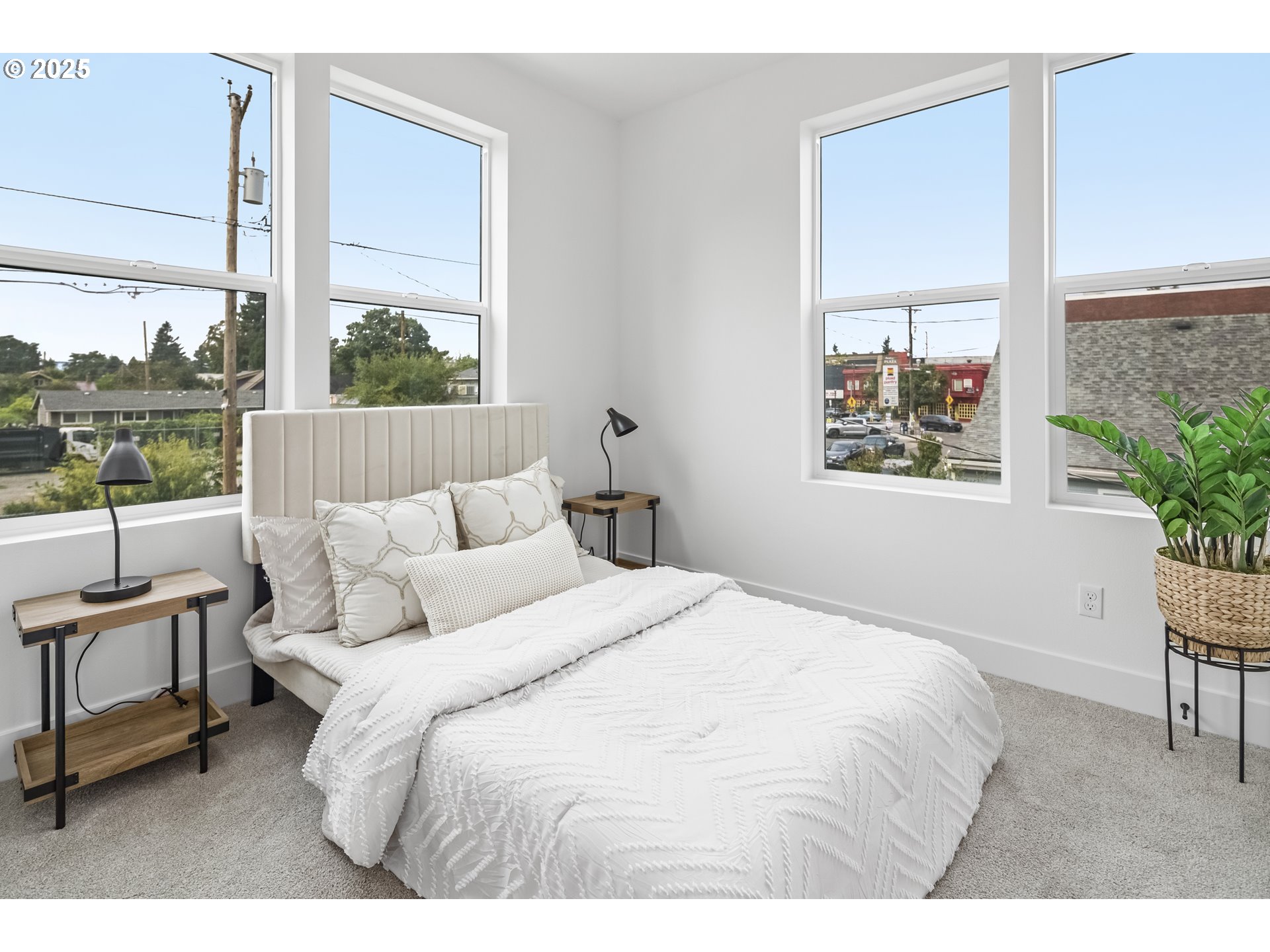 4732 Southeast 65th Avenue Portland, OR 97206 - Photo 9 of 16 a bedroom with a bed and a window
