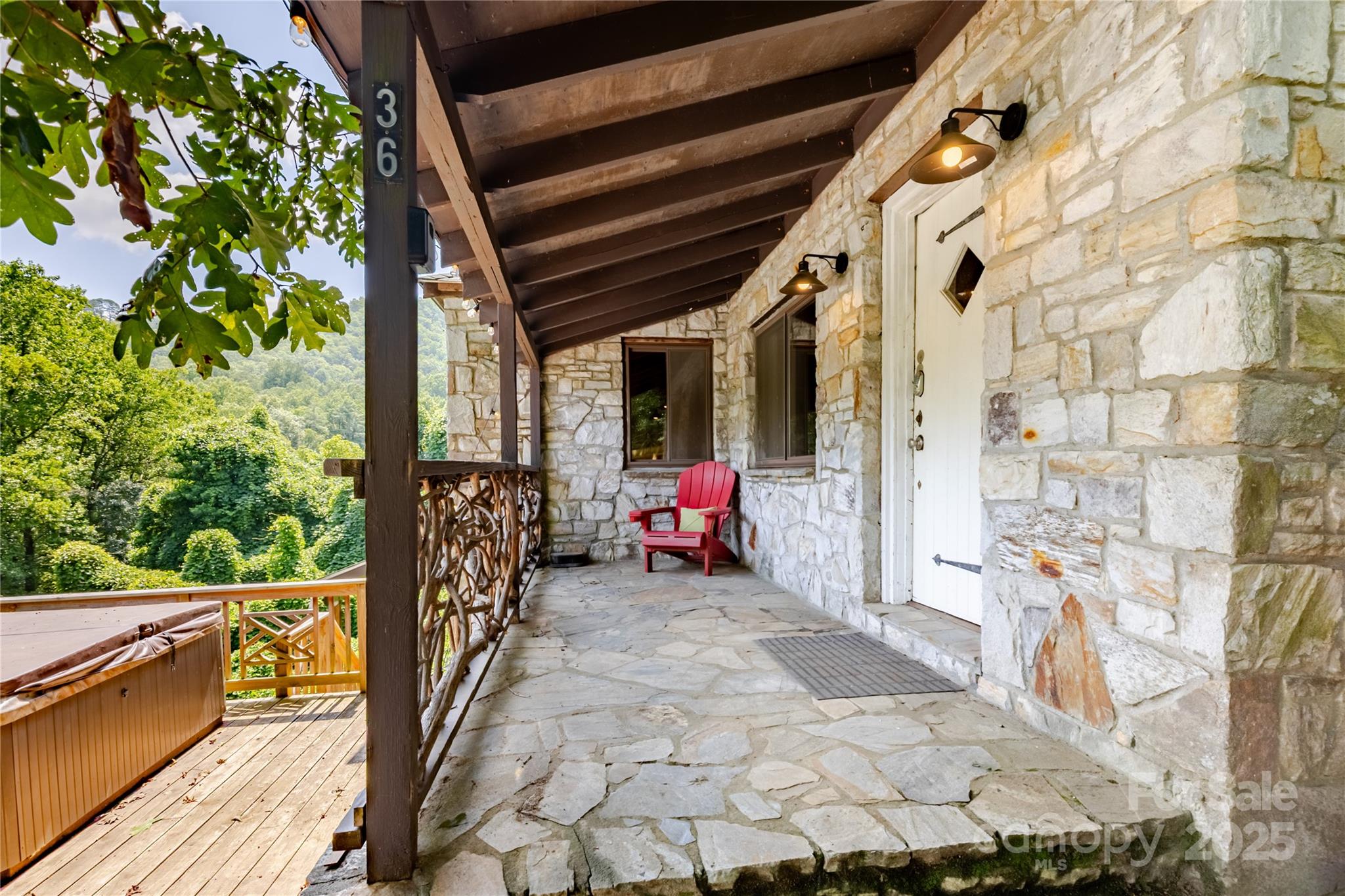 160 Observation Point Road Bryson City, NC 28713 - Photo 2 of 26 a view of a porch with seating space