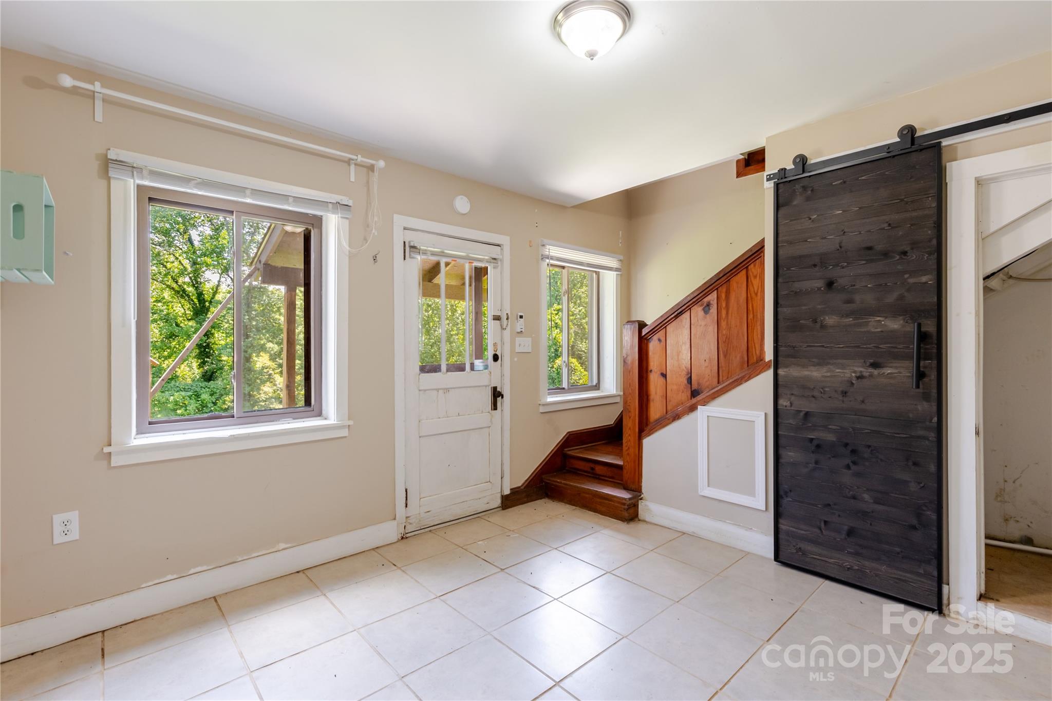 160 Observation Point Road Bryson City, NC 28713 - Photo 21 of 26 an entryway and livingroom with furniture