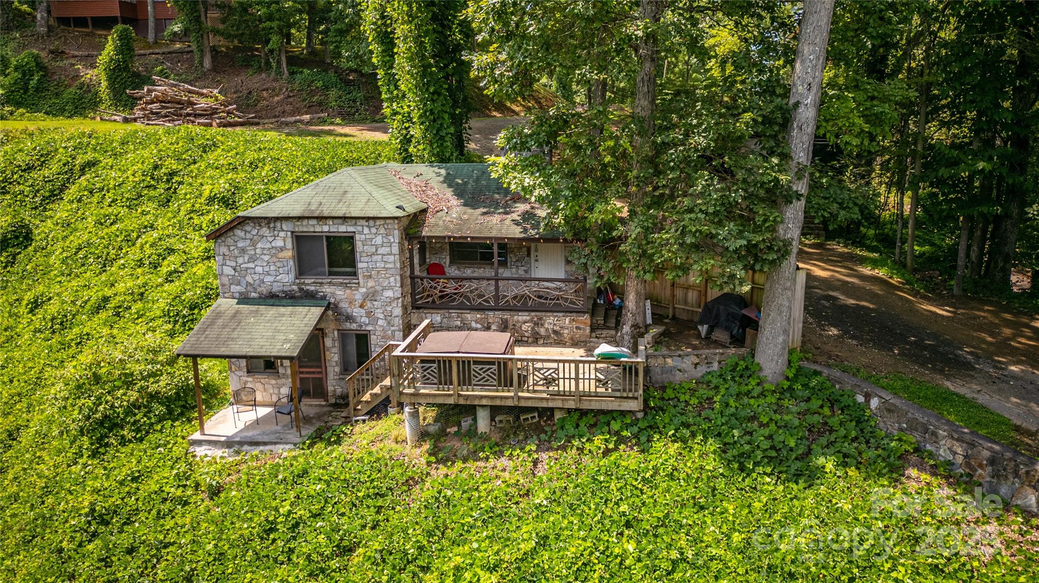 160 Observation Point Road Bryson City, NC 28713 - Photo 24 of 26 a aerial view of a house with swimming pool and sitting area