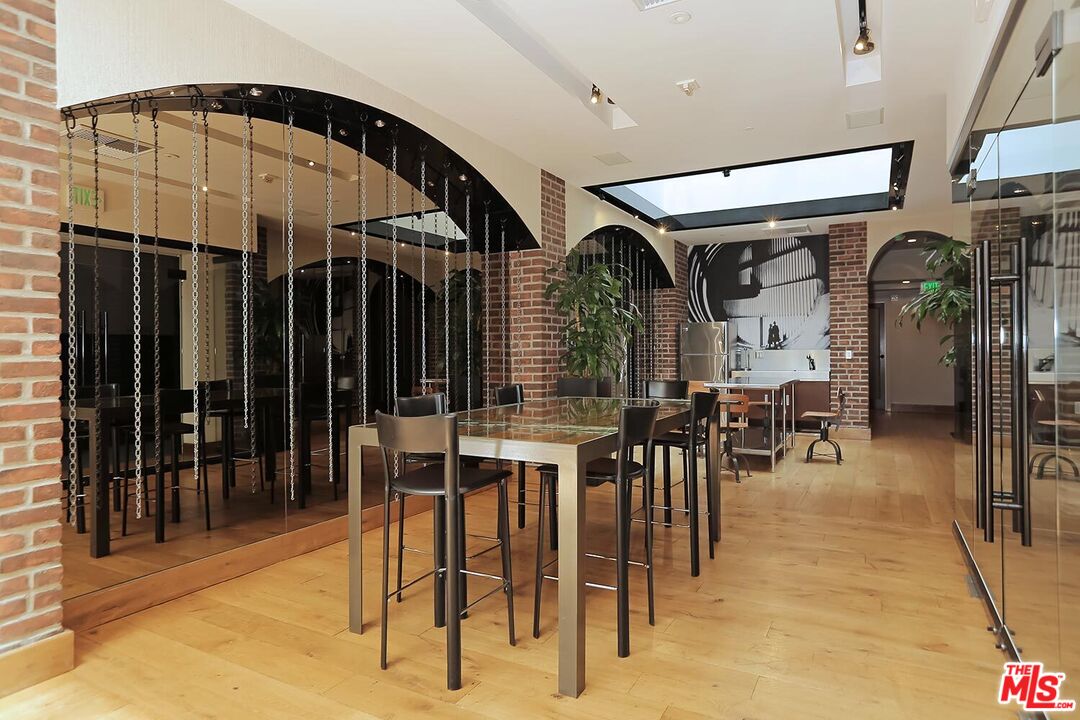 460 South Spring Street, Unit 201 Los Angeles, CA 90013 - Photo 24 of 27 a view of dining area with chairs
