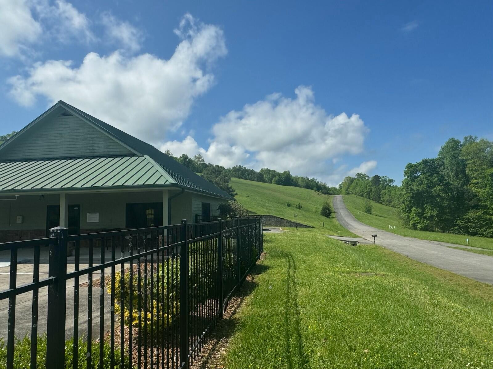 44 Mill Drive Decatur, TN 37322 - Photo 7 of 11 a view of a house with a yard