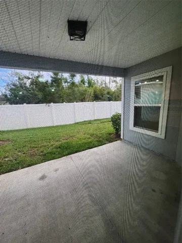 a view of a porch with backyard
