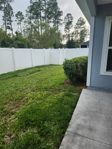 a view of a backyard with garden